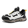 Men's black rotating button dad shoes with mesh upper and platform sole.