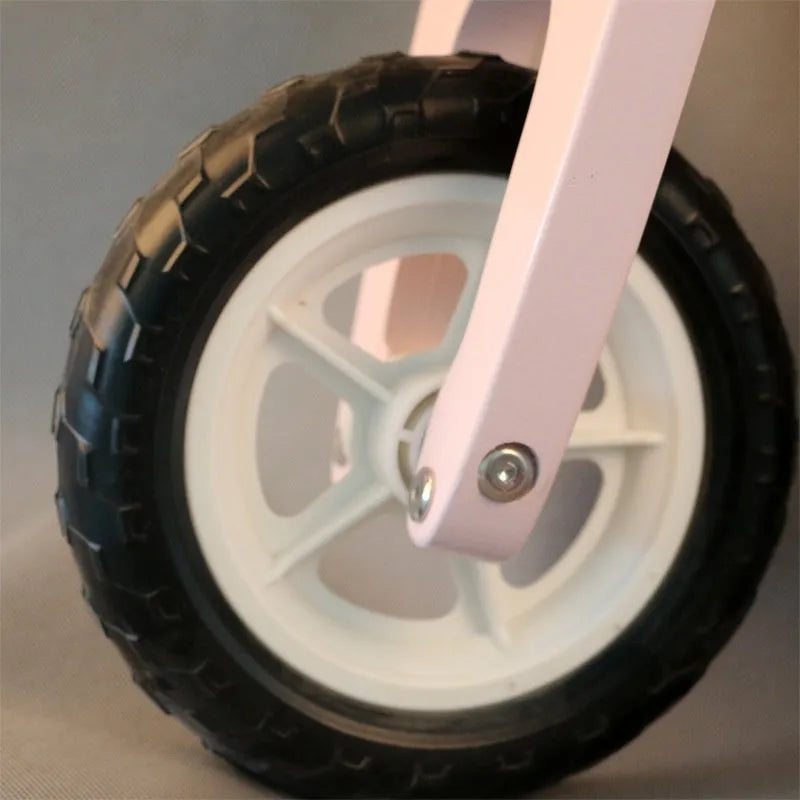 Pink wooden toddler balance scooter for children aged 1-6 years with 10-inch size