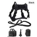 Tactical nylon dog vest with adjustable straps in army green on outdoor backdrop
