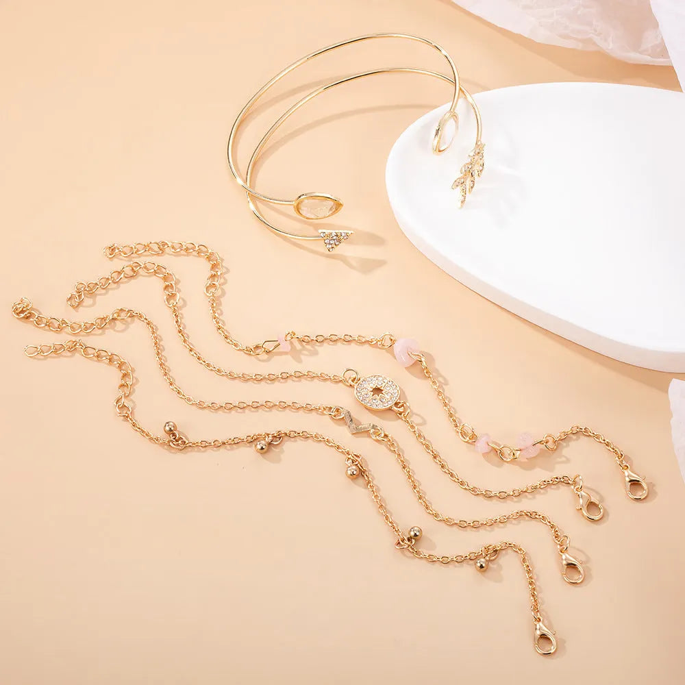 Women's six-piece bracelet set with golden spot drill, arrow and water drop charms
