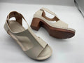Plus size women's wedge sandals with peep toe, Roman buckle detail, and fish mouth design