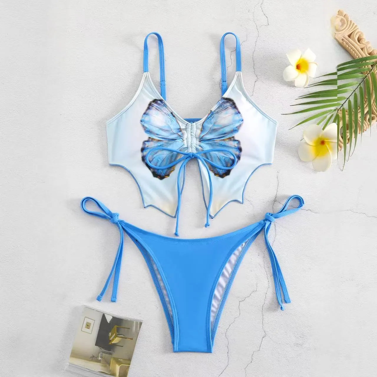 Women's purple bikini with bow ins style back detailing and briefs bottoms