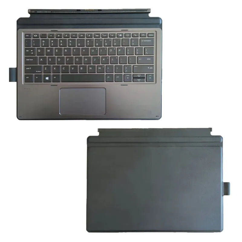 Wireless tablet keyboard on a desk next to an Elite X2 tablet, showing multimedia keys.