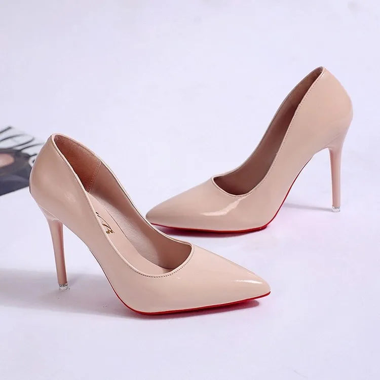 Women's solid colour stiletto heel pump with pointed toe and shallow mouth cut on a rubber sole.