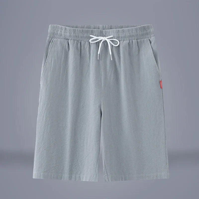 Cotton-linen blend cropped pants in a solid colour with a drawstring waist, shown in a mid-length cut.