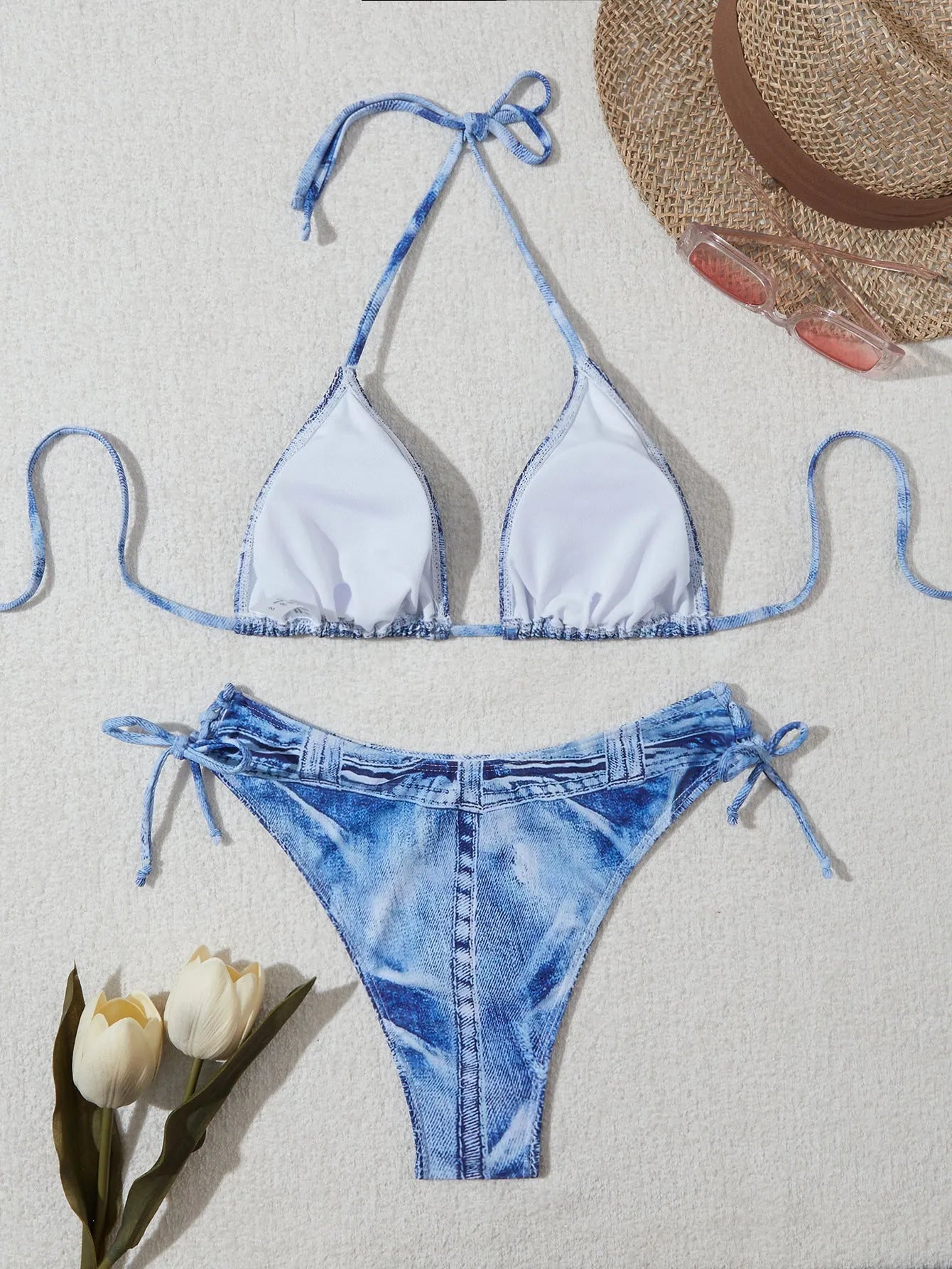 Women's denim blue printed bikini with adjustable straps, shown front view