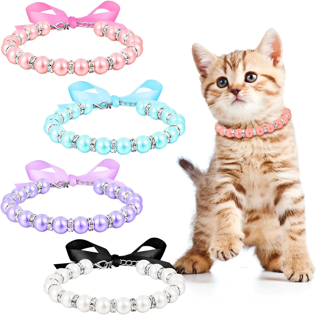 Adjustable diamond dog pearl necklace with rhinestones and ribbon bow in blue, pink, purple, or white.