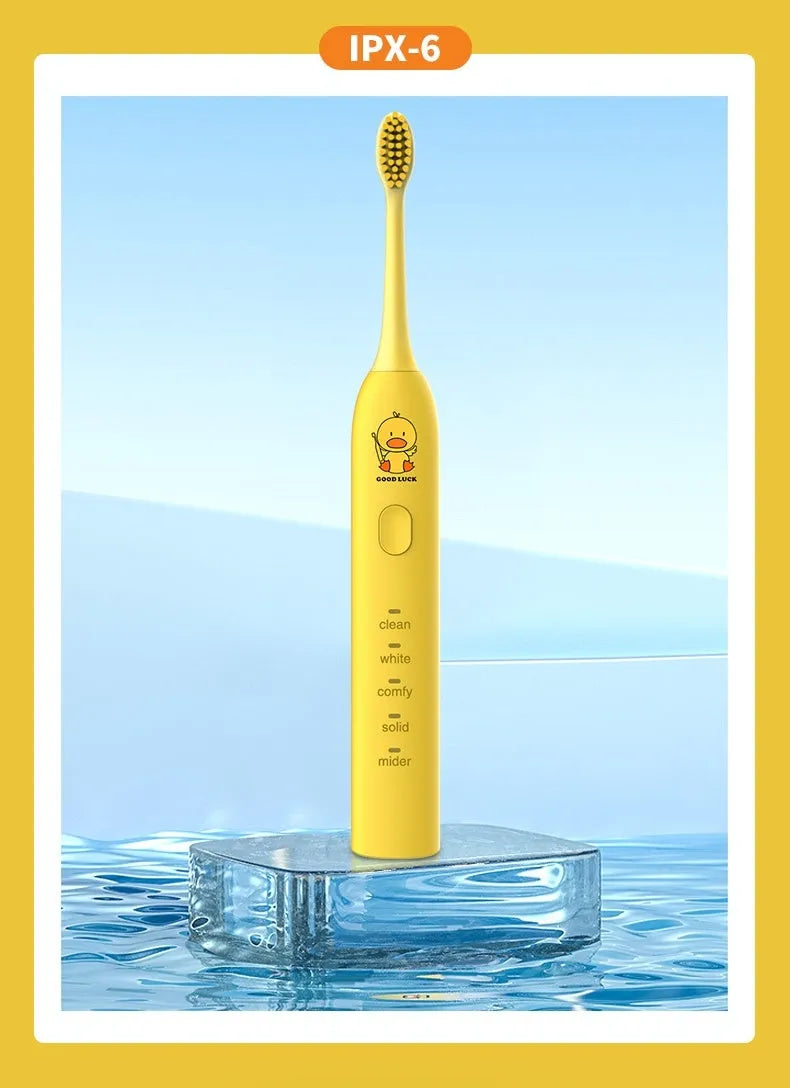 Small yellow duck USB rechargeable electric toothbrush with soft bristles in yellow colour