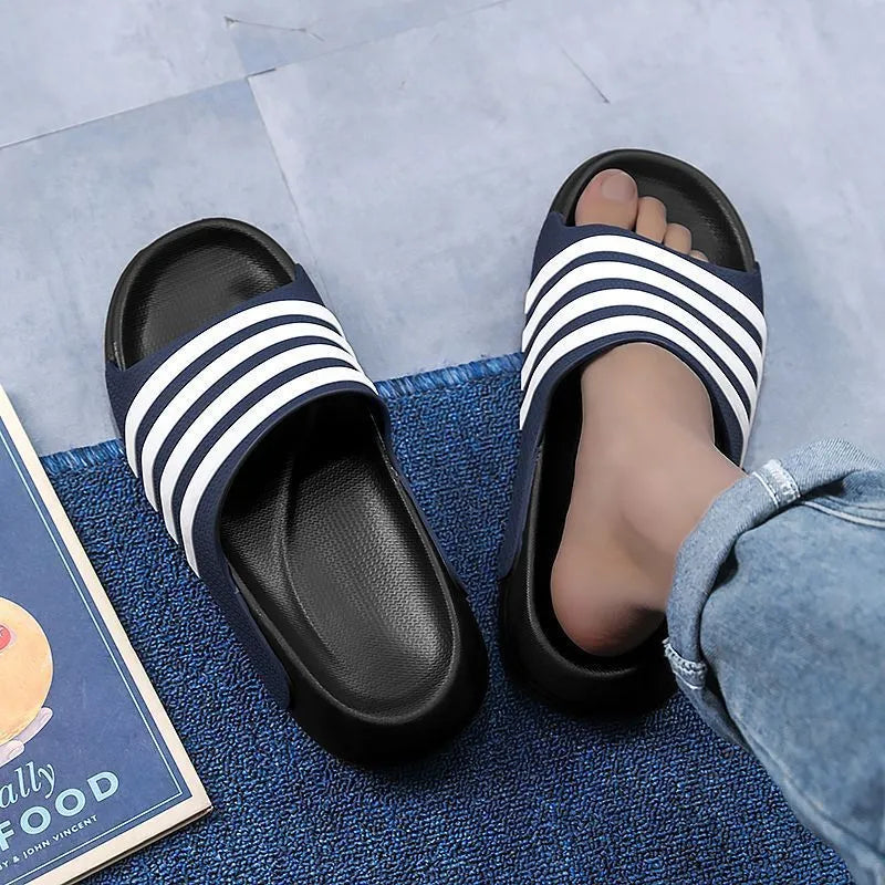 Men's casual slippers with a PVC upper and EVA sole in a two-tone colour option on a plain background.