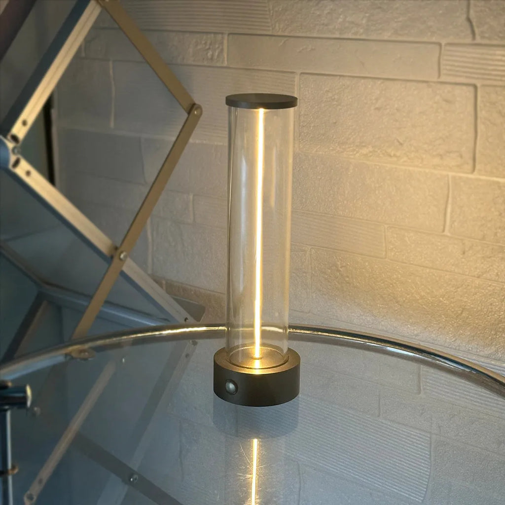 Modern white glass LED line light with magnetic base for USB rechargeable accent lighting