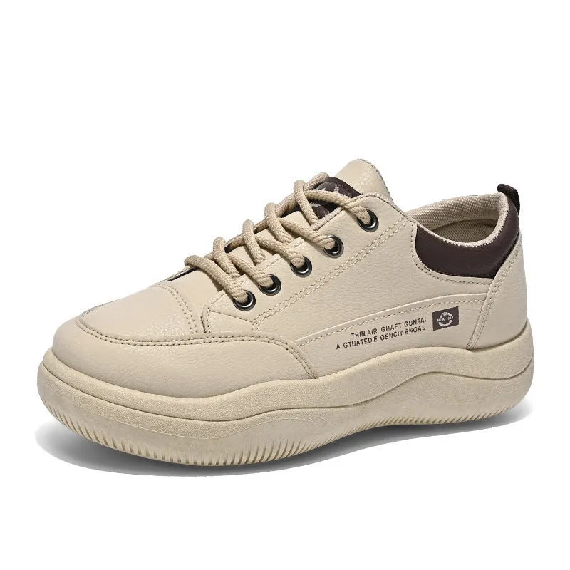Women's white Korean-style leather pumps with cross straps and a flat mid-height heel.