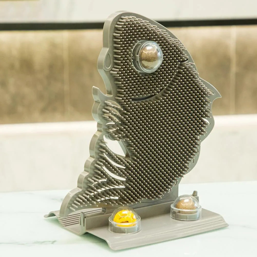 Plastic cat wall scratcher fish shape 31cm with self-grooming brush and catnip balls