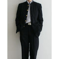 Solid black Korean style casual suit blazer with long sleeves, loose fit, and patch pockets on model