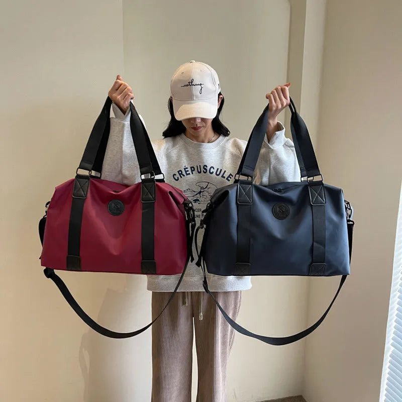 Waterproof Oxford cloth travel bag with 36-55 litre capacity in solid colour design