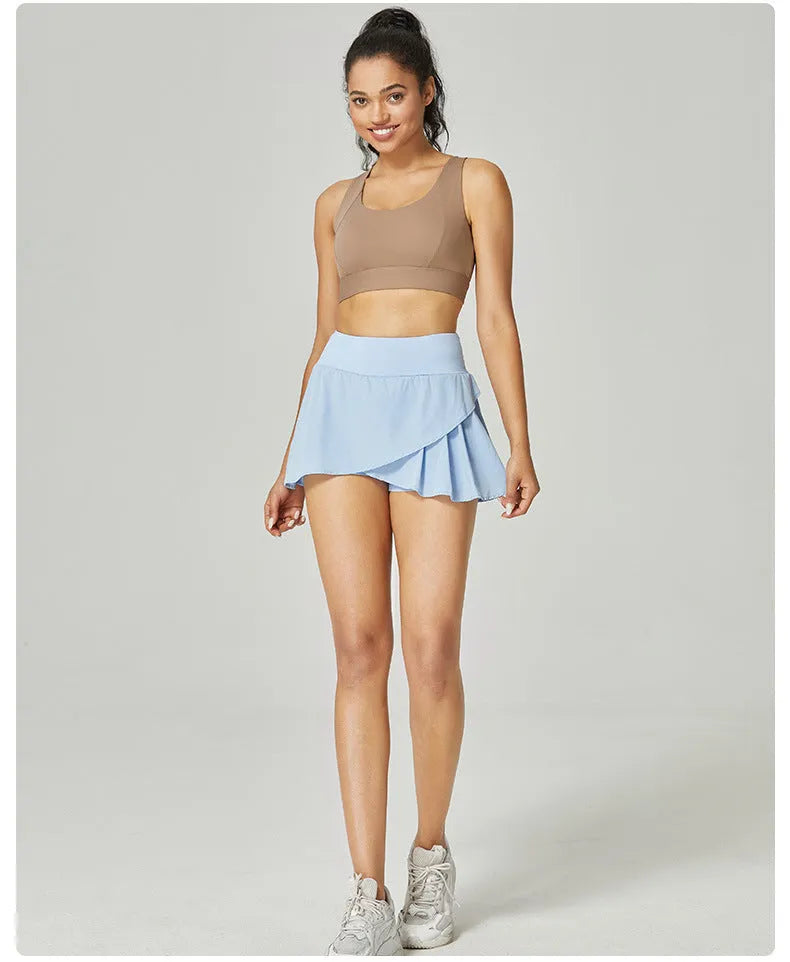 Women's solid colour quick-drying sports shorts in nylon and spandex for running and fitness.