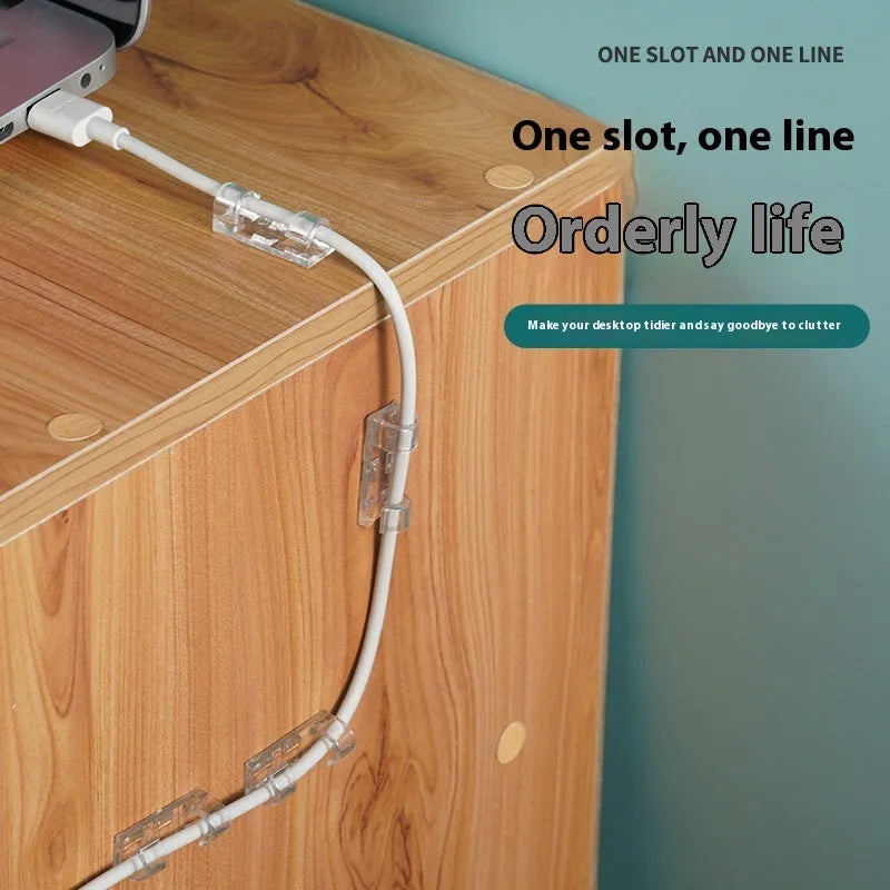 Transparent self-adhesive plastic snap clips for cable management on a white background.