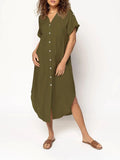 A woman wearing a casual solid-colour mid-length dress with a button-down front.