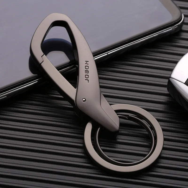 Zinc alloy double key ring for car keys in black, chrome, or nickel finish, shown next to a 30cm ruler for scale.