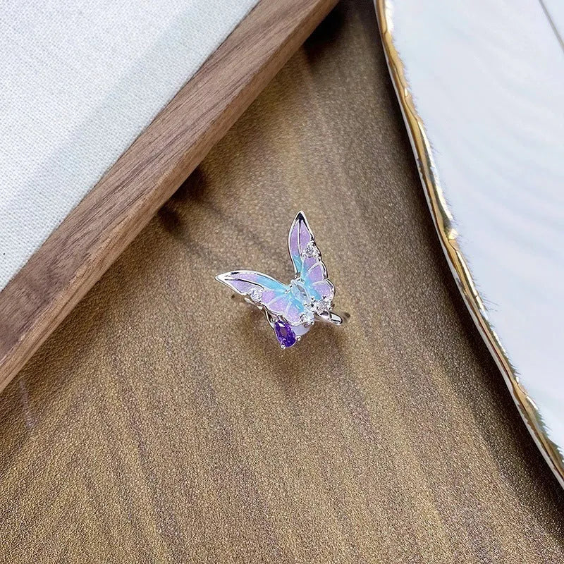 Copper insect fashion ring with adjustable opening and dripping oil colour finish.