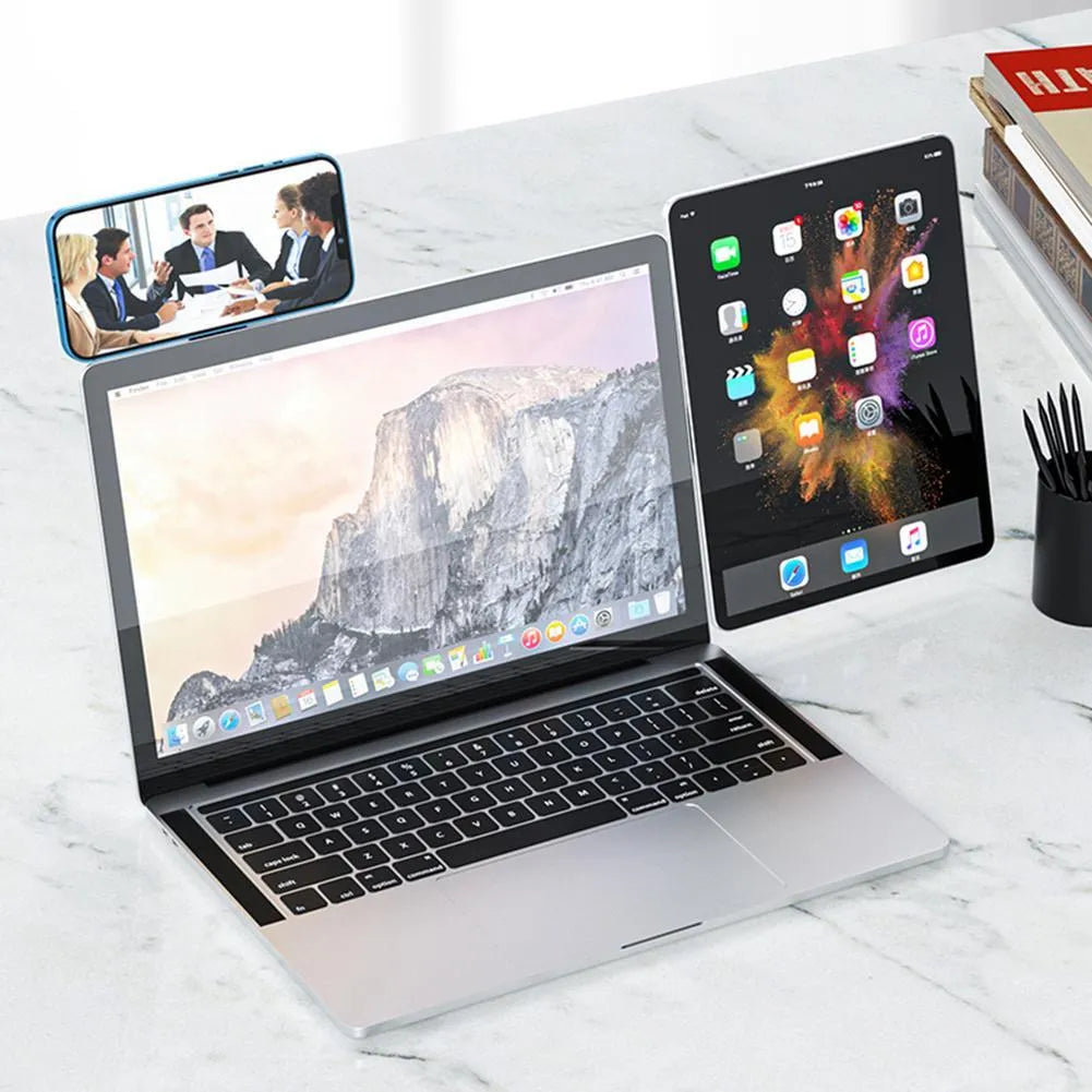 Black aluminium laptop phone holder with magnetic mount attached to laptop showing dual screen setup