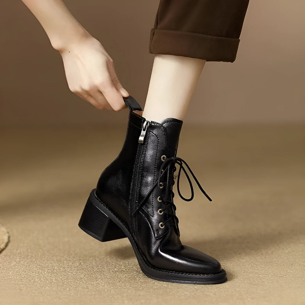 Women's black pointed-toe short tube boots with 13cm sock length and artificial PU upper