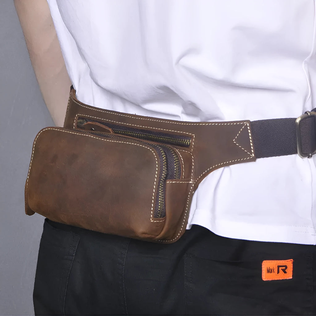 Brown top layer cowhide men's sports waist bag with zipped closure shown from front