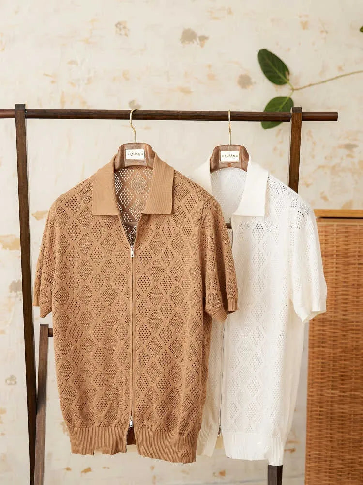 Light coffee coloured zip-front cardigan with short sleeves and a lapel collar laid flat.