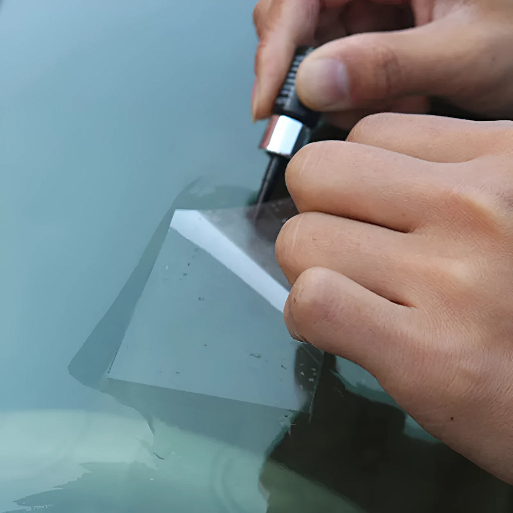 Yellow car windscreen repair kit with three pieces including UV curing resin and injection tools