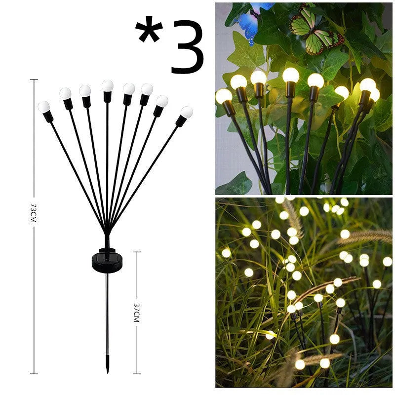 Solar-powered LED ground spike garden light with multiple heads and stainless steel soil plug.