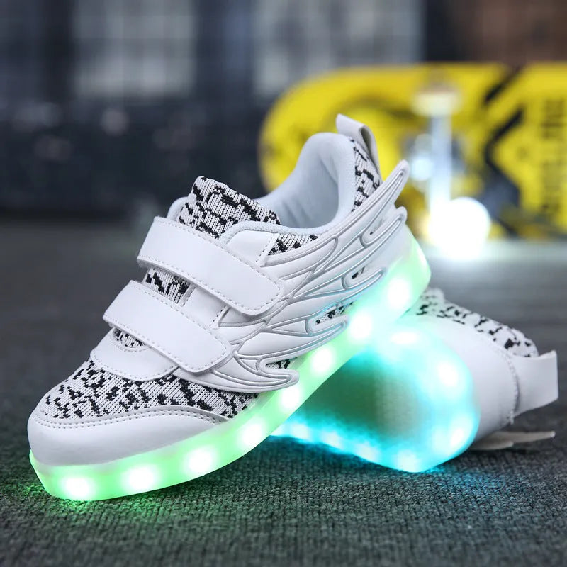 Plum red children's LED light-up sneakers with colourful flashing soles on a white background.