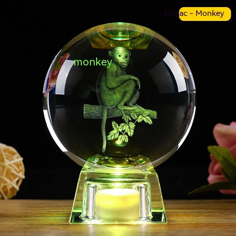 Chinese zodiac crystal ball lamp with electronic charging base showing animal design