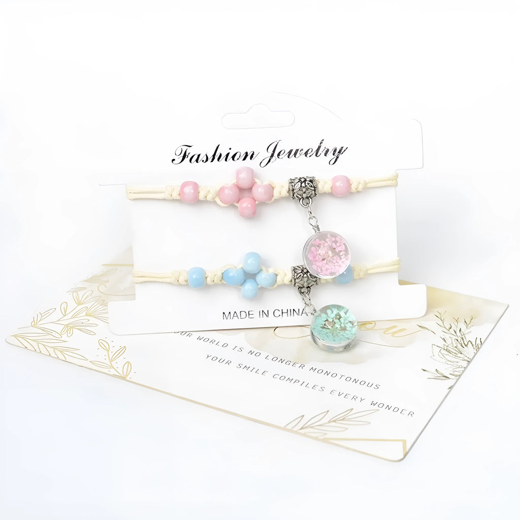 Glass dried flower bracelet with large 1.4cm beads containing real preserved flowers in hand-woven design