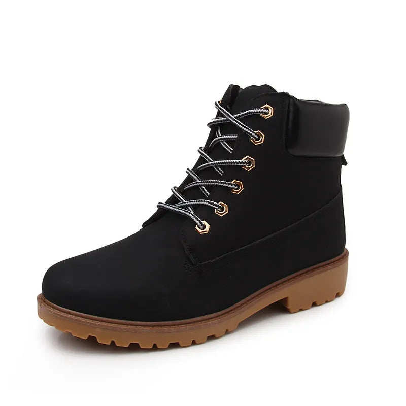 Men's pink Martin ankle boots with velvet lining, round toe, flat sole, and front lace-up closure.