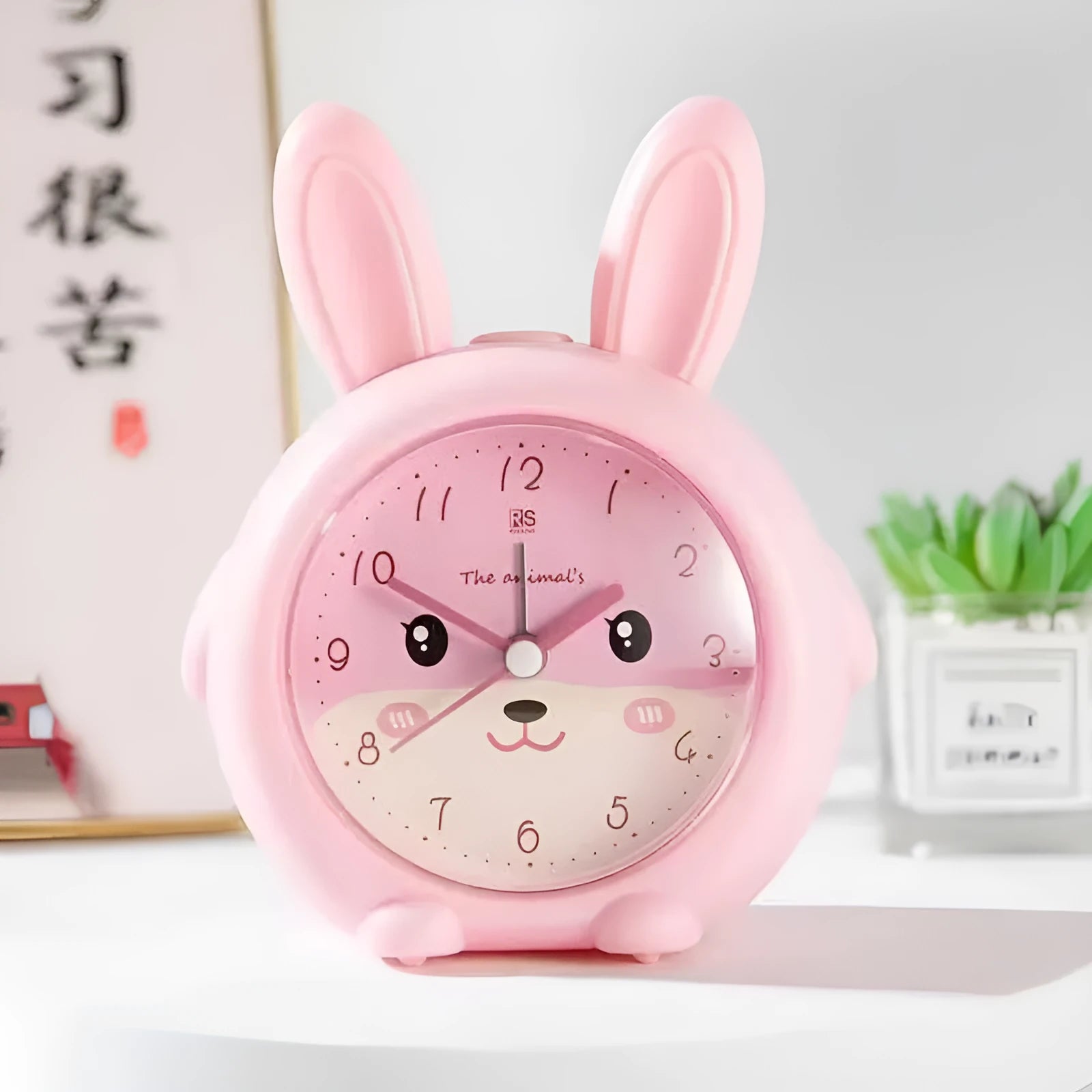 Cartoon style children's alarm clock with ABS plastic shell showing call, ring, mute, night light and snooze functions