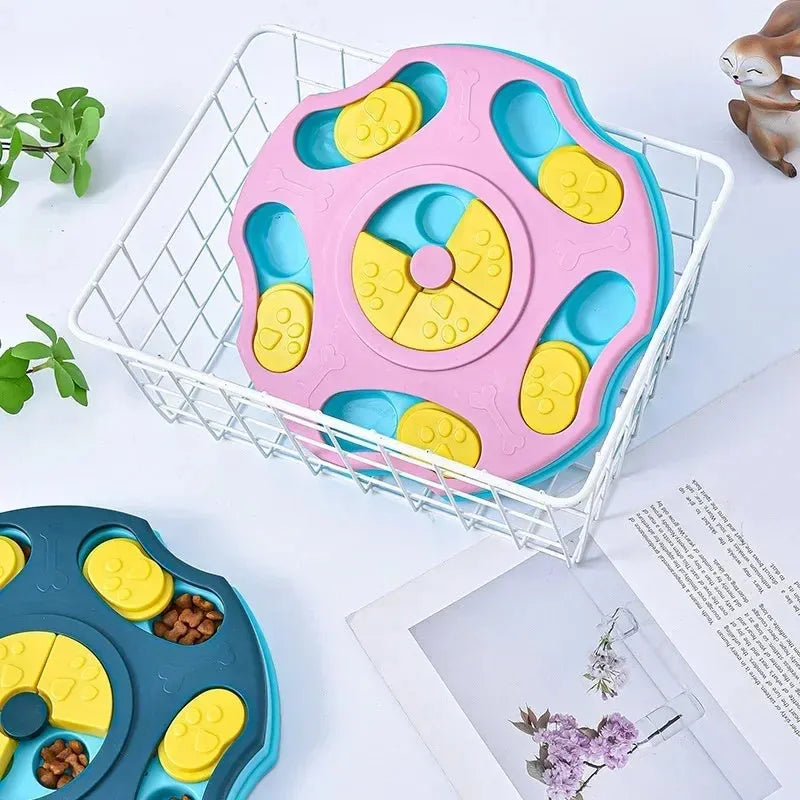 Blue and pink dog puzzle feeder toy with food compartments for interactive play and slow feeding