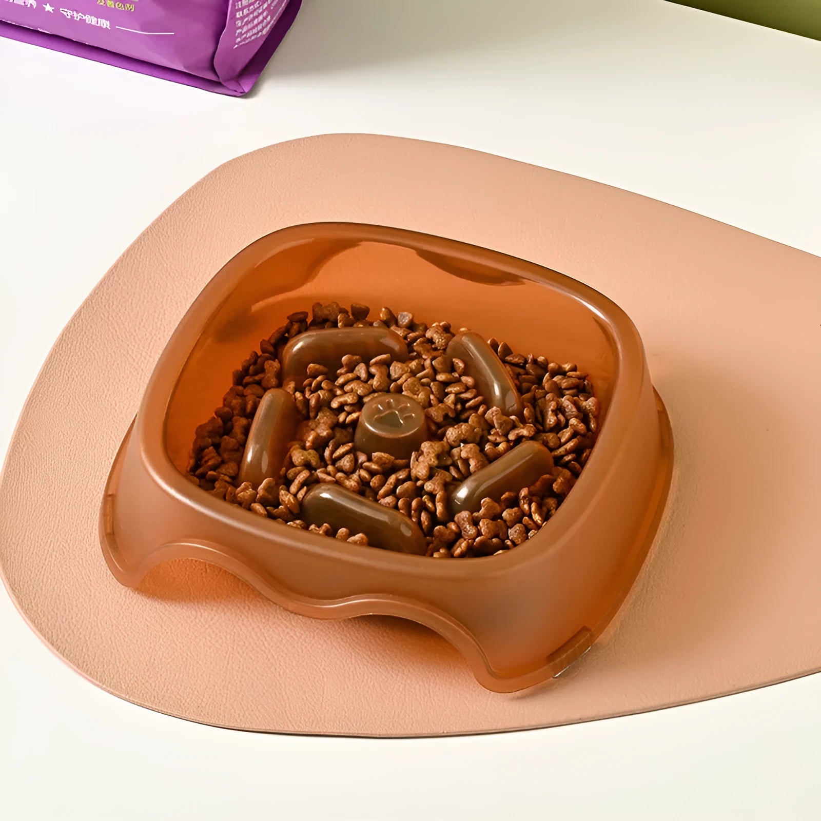 Blue slow feeder dog bowl with internal ridges to prevent fast eating and choking.
