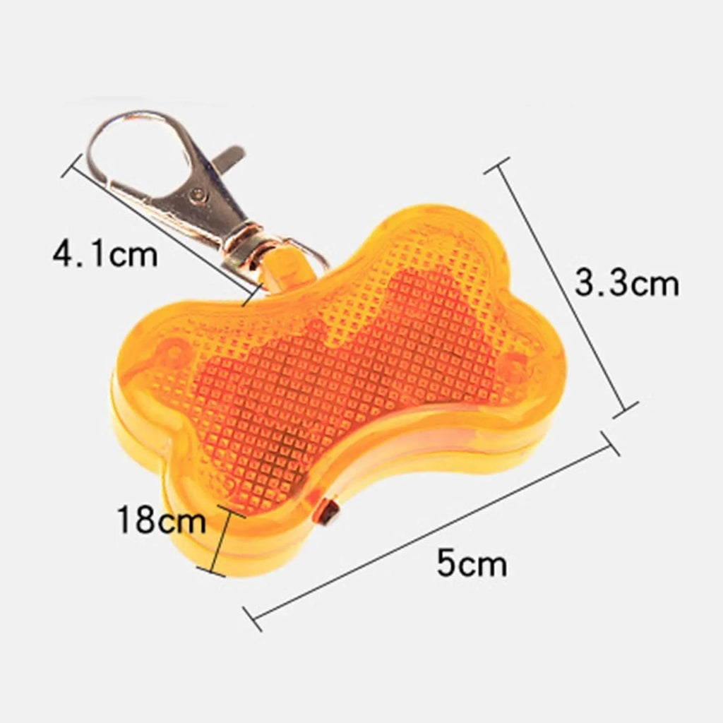 Pet LED bone luminous pendant attached to collar with blue light glowing