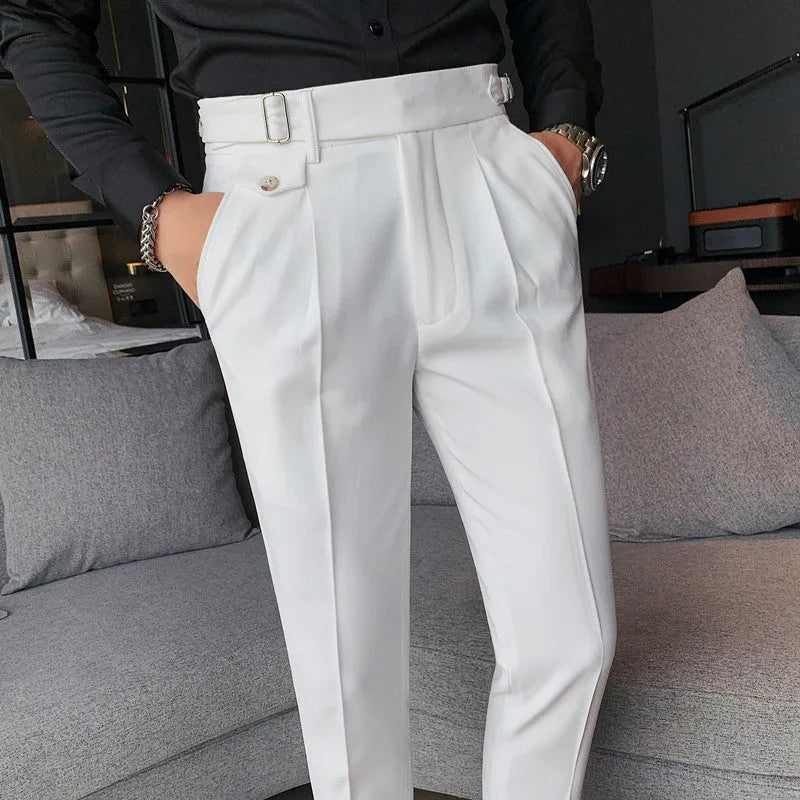Straight-leg solid colour casual trousers in polyester on a size chart showing waist sizes 29 to 36.