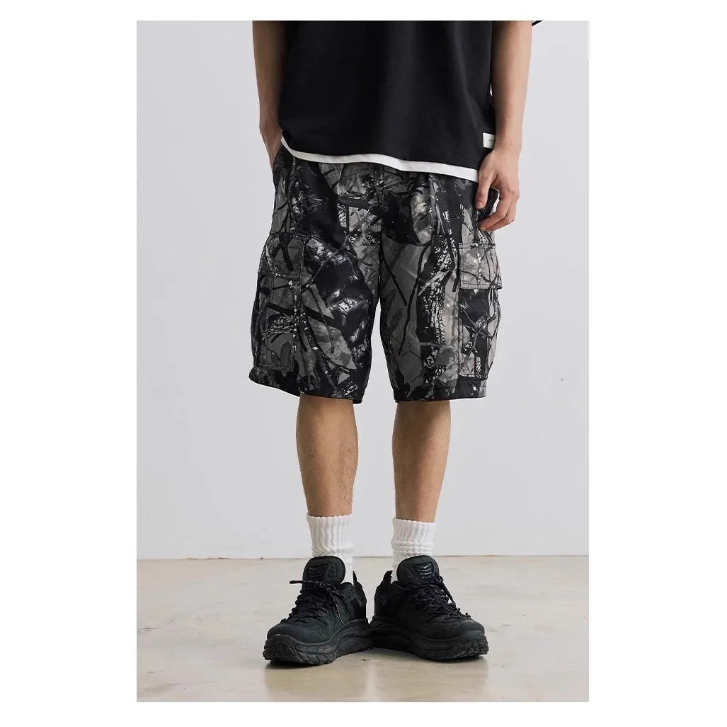 Loose fit denim shorts in army green with a straight leg and elastic waistband.