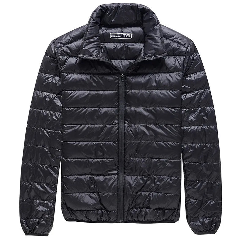 Men's and women's thin ski suit in black, designed for windproof and waterproof winter sports protection.
