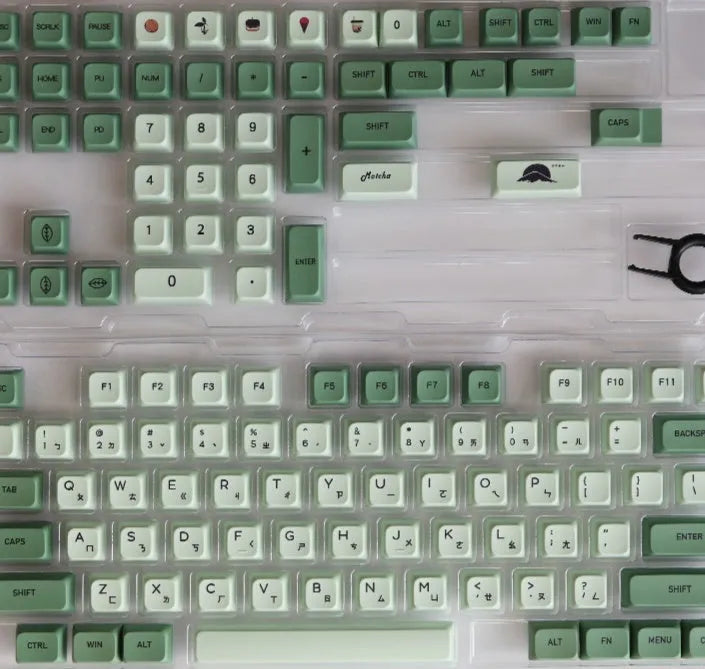 124 PBT keycaps in Matcha green colour arranged by language layout for mechanical keyboards