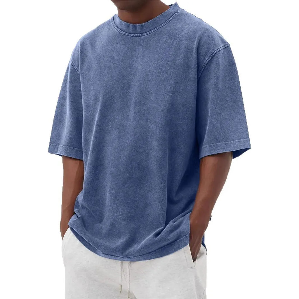 Men's washed distressed pullover t-shirt in solid colour with loose fit and stone washed finish
