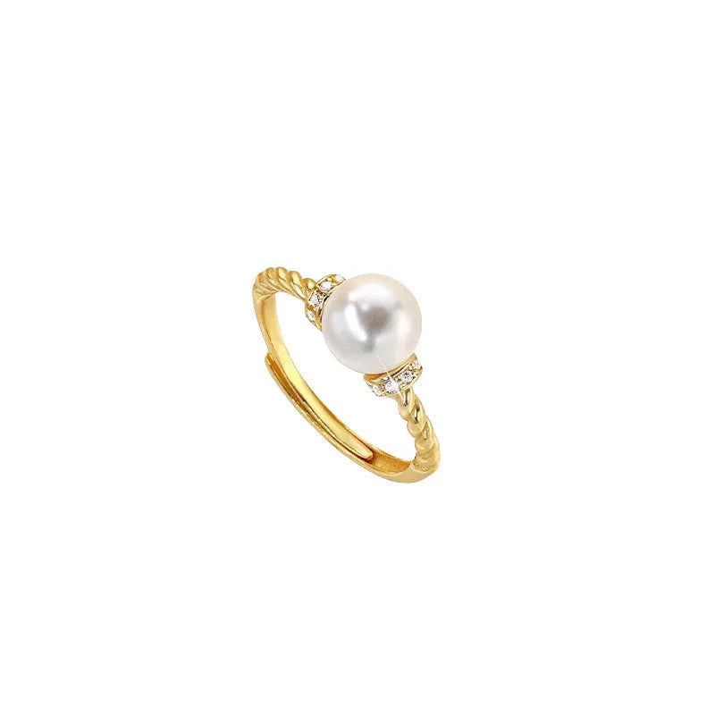 Adjustable copper ring with antique twist design and pearl inlay detail