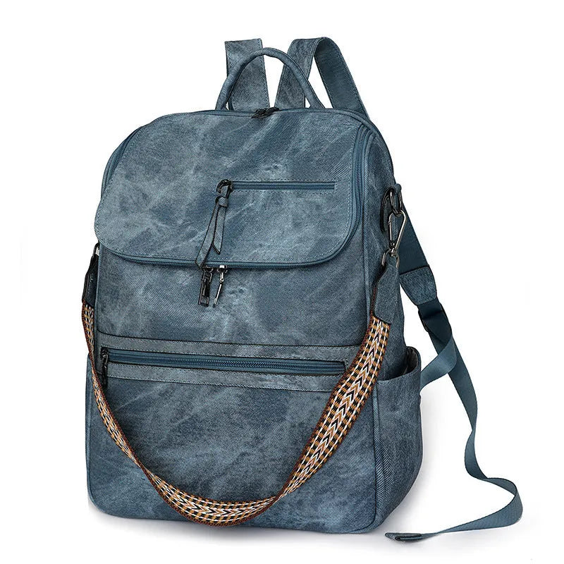 Retro college backpack in black PU leather with curved shoulder straps and stitching details