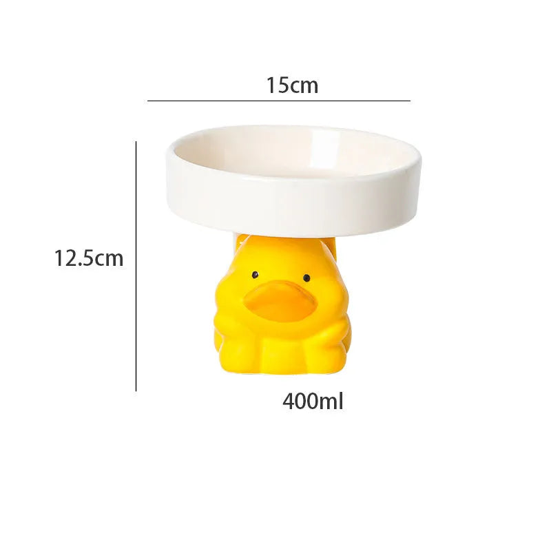 Raised ceramic cat food bowl in animal design, showing elevated height and wide bowl.