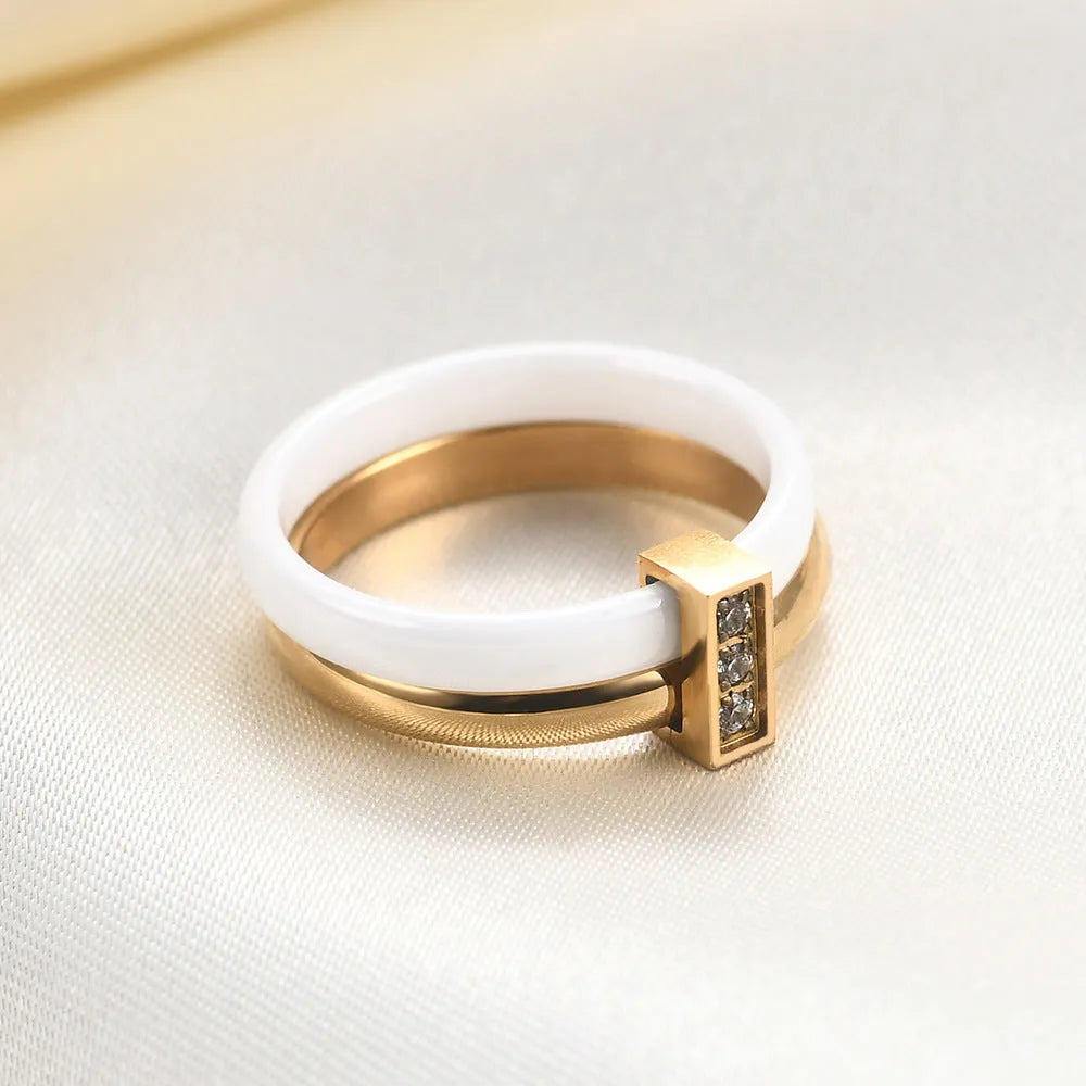 Ceramic women's ring with glossy stitching and zirconium accents in steel black or golden white, 6mm width
