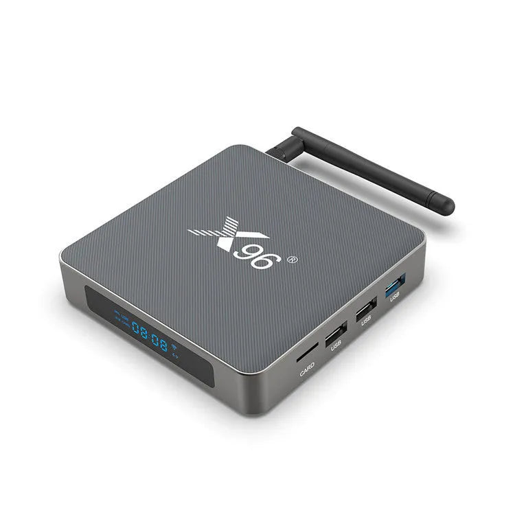 Android smart TV box set-top unit with remote control on a wooden table
