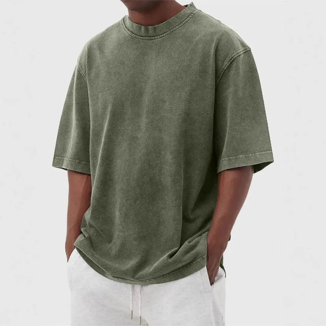 Men's washed distressed pullover t-shirt in solid colour with loose fit and stone washed finish