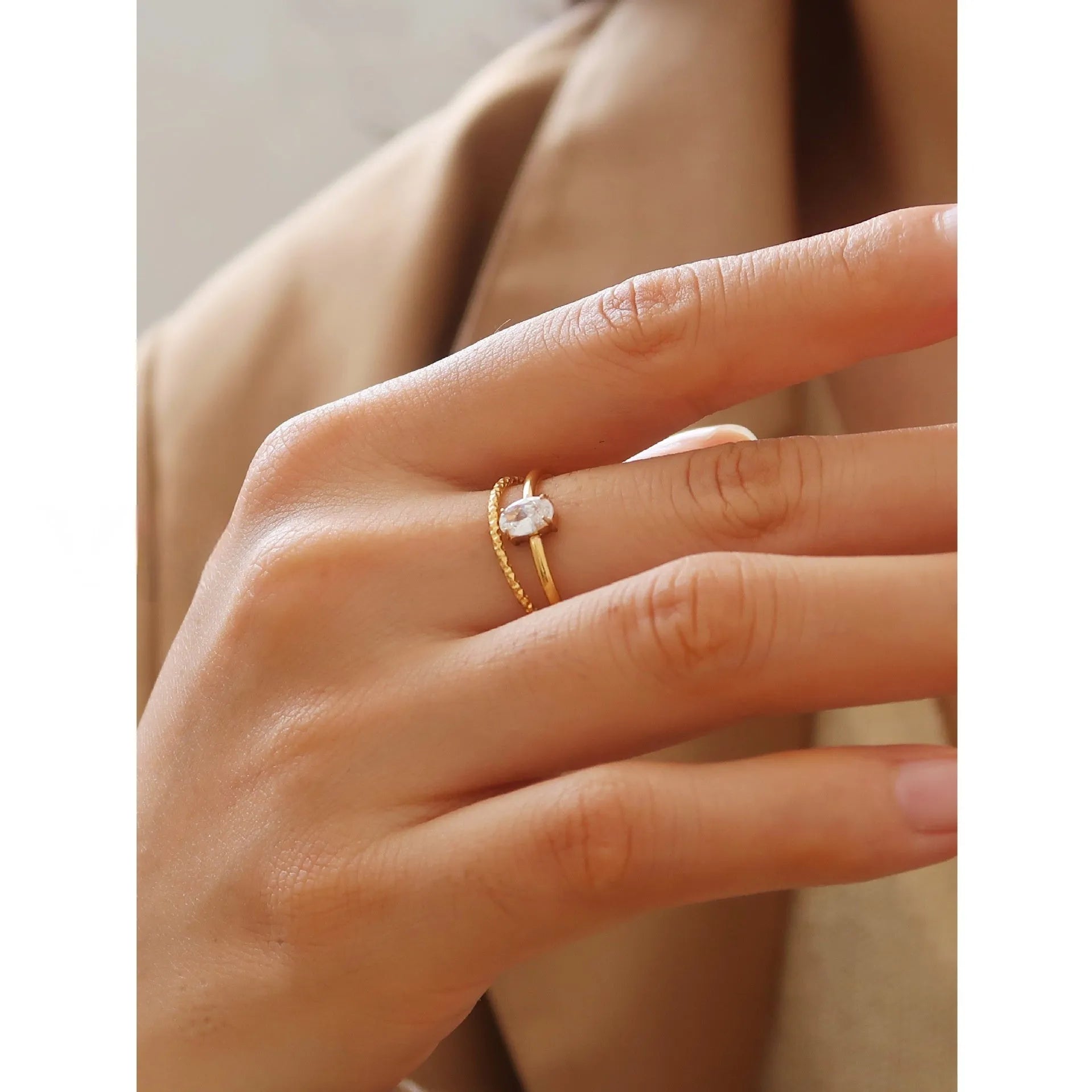 Golden electroplated stainless steel ring with love heart or oval design for women in sizes 6, 7 and 8