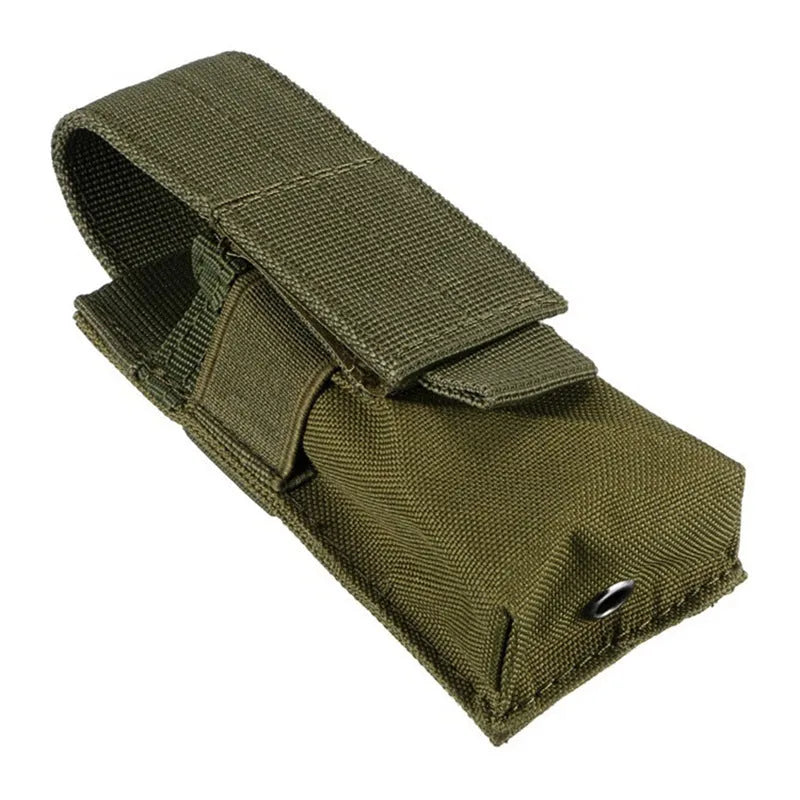 Black tactical molle waist bag for pistol cartridges or a small flashlight, showing elastic cord buckle.
